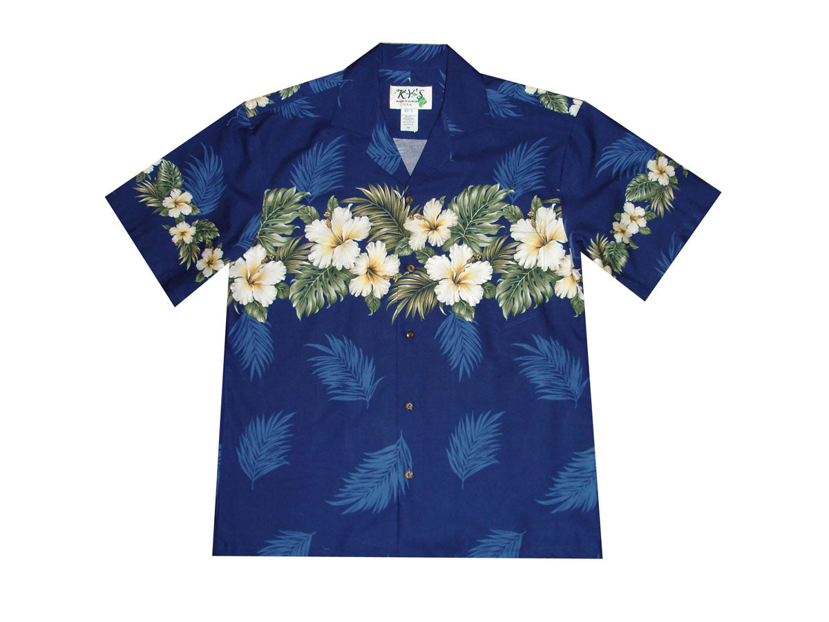 Yellow Hibiscus Hawaiian shirt in a tropical outdoor setting